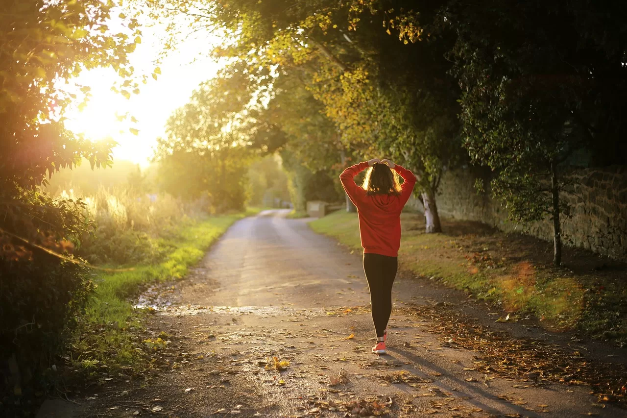 a woman walking in nature